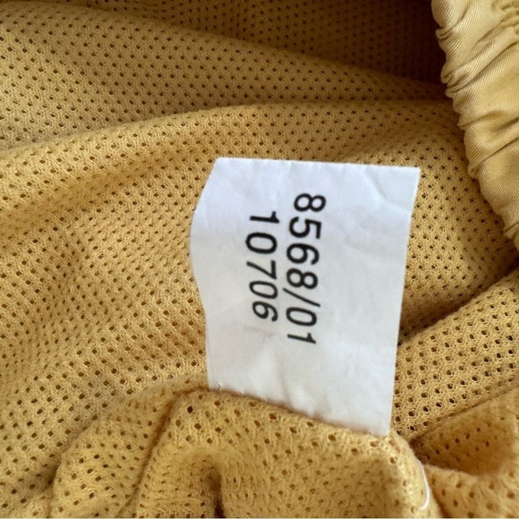 Antigua Women's Golf Jacket Windbreaker Large Yellow Half Zip Pockets Outdoors - Picture 12 of 12